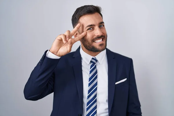 Handsome Hispanic Man Wearing Suit Tie Doing Peace Symbol Fingers — Stock Photo, Image