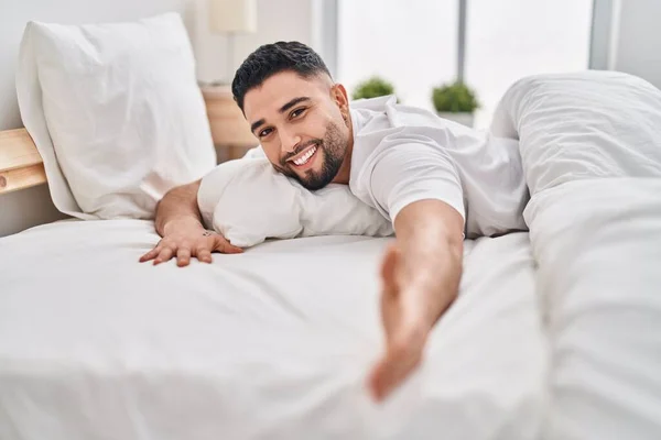 Young Arab Man Smiling Confident Lying Bed Bedroom —  Fotos de Stock