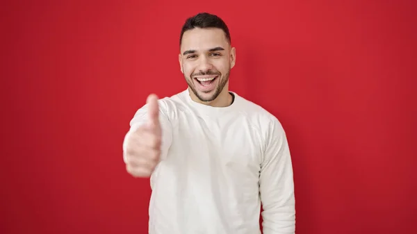 Jonge Latino Man Glimlachen Zelfverzekerd Doen Teken Met Duim Omhoog — Stockfoto