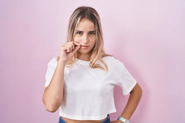 Young Blonde Woman Standing Pink Background Mouth Lips Shut Zip — Stockfoto