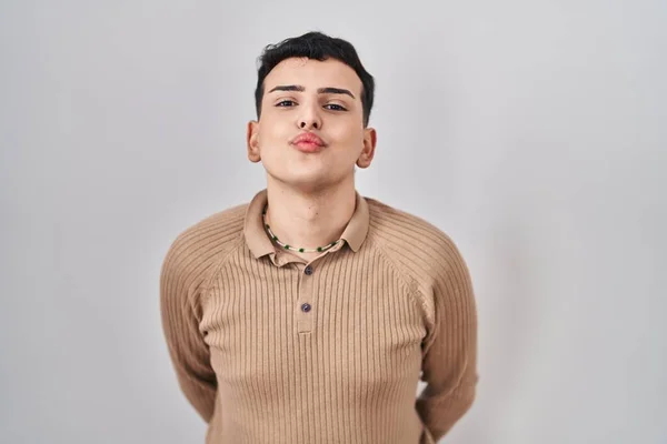 Non Binary Person Standing Isolated Background Looking Camera Blowing Kiss — стоковое фото