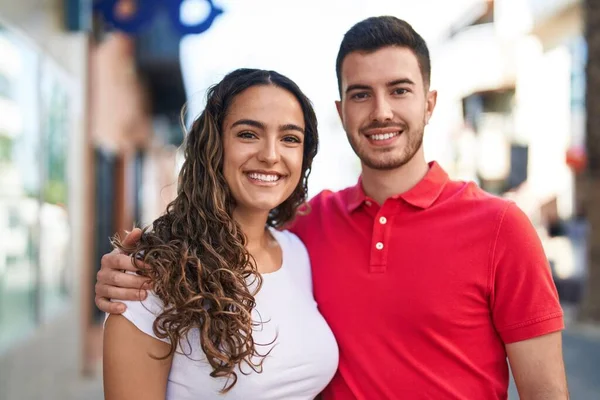 Young Hispanic Couple Smiling Confident Hugging Each Other Street — Stockfoto