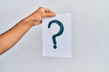 Hand of caucasian man holding paper with question mark over isolated white background