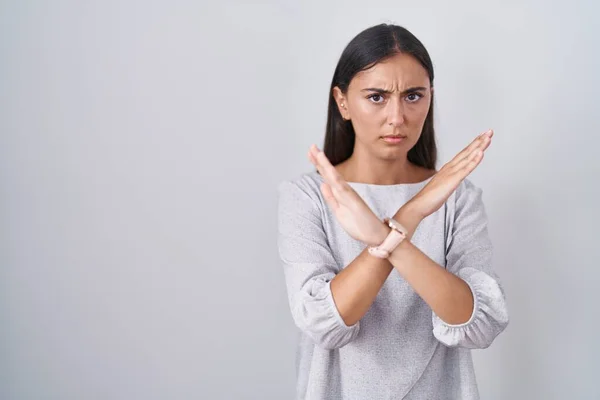 Young Hispanic Woman Standing White Background Rejection Expression Crossing Arms — Stockfoto