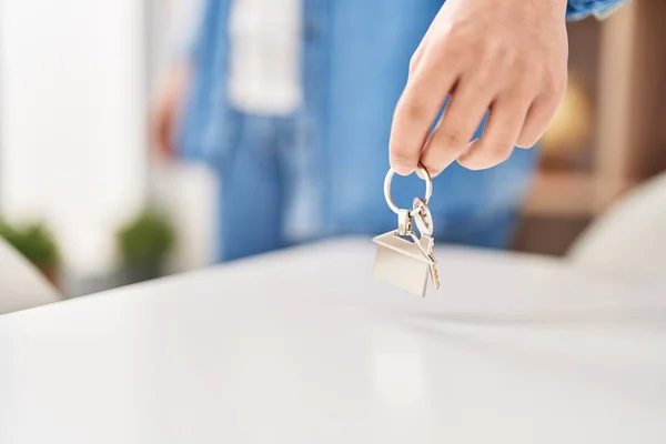 Young Non Binary Man Holding Keys Home — Stockfoto