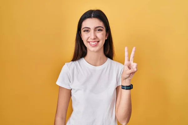 Young Beautiful Woman Standing Yellow Background Showing Pointing Fingers Number — Stock Photo, Image