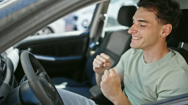 Young Hispanic Man Driving Car Winner Expression Street — Stock Photo, Image