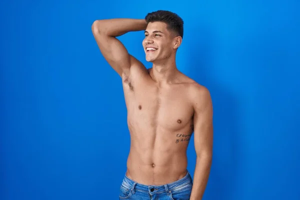Young Hispanic Man Standing Shirtless Blue Background Smiling Confident Touching — Stock Photo, Image