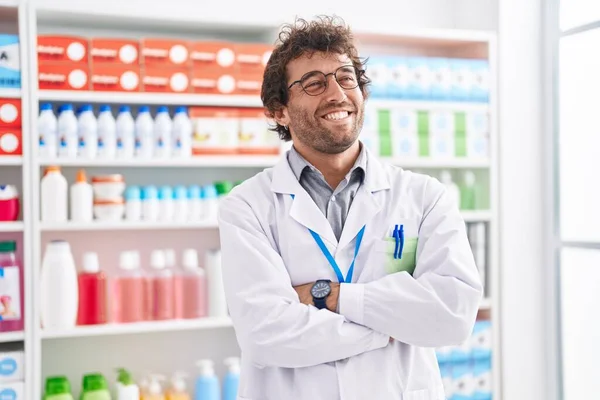 Young Hispanic Man Pharmacist Smiling Confident Standing Arms Crossed Gesture — Stock Fotó