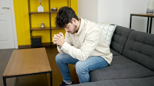 Young Hispanic Man Stressed Sitting Sofa Home — Foto Stock