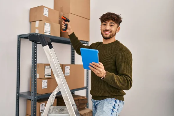 Young Arab Man Ecommerce Business Worker Scanning Package Office — Stockfoto