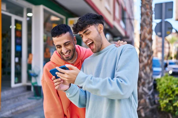 Two Man Couple Hugging Each Other Using Smartphone Street —  Fotos de Stock