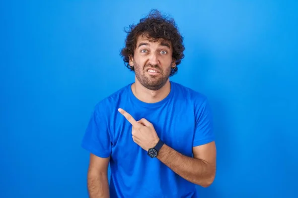 Hispanic Young Man Standing Blue Background Pointing Aside Worried Nervous — Stock Photo, Image
