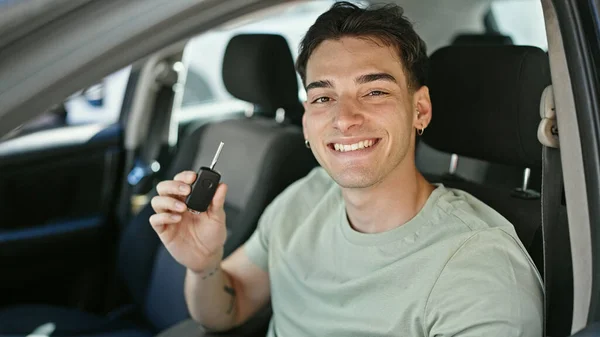 Young Hispanic Man Smiling Confident Holding Key New Car Street — стоковое фото