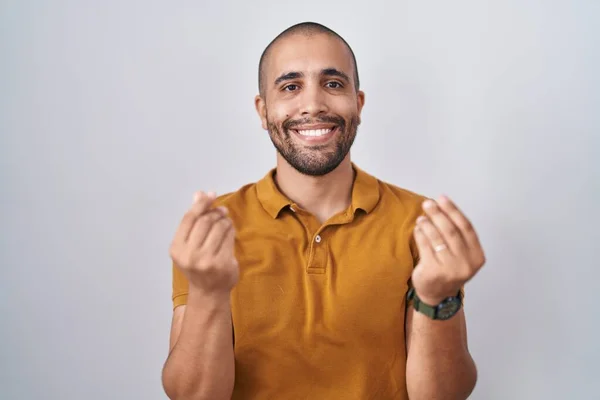 Hispanic Man Beard Standing White Background Doing Money Gesture Hands — Stok fotoğraf