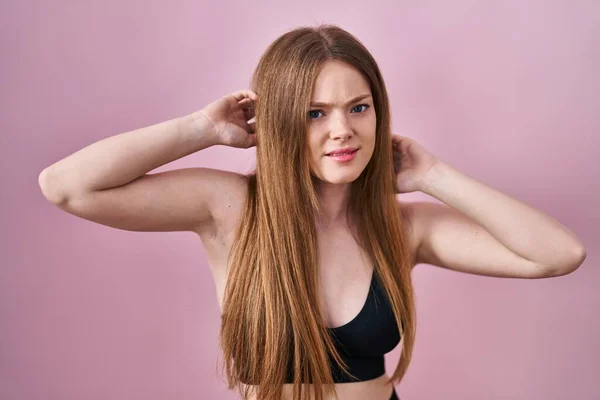 Young Caucasian Woman Wearing Lingerie Pink Background Clueless Confused Expression — Stock Photo, Image