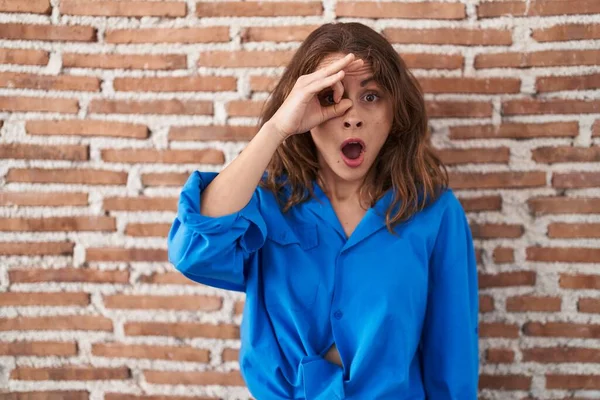Beautiful Brunette Woman Standing Bricks Wall Doing Gesture Shocked Surprised — Stock Photo, Image