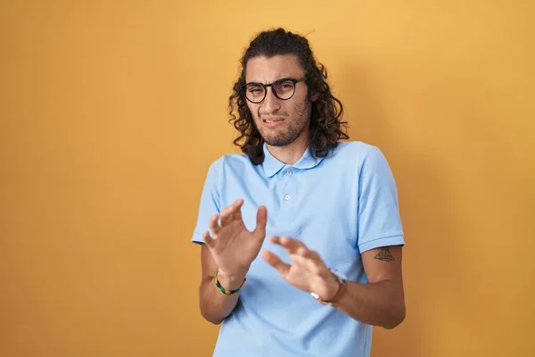 Young Hispanic Man Standing Yellow Background Disgusted Expression Displeased Fearful —  Fotos de Stock