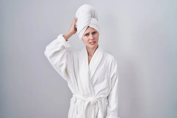 Blonde Caucasian Woman Wearing Bathrobe Confuse Wondering Question Uncertain Doubt — Stock Photo, Image
