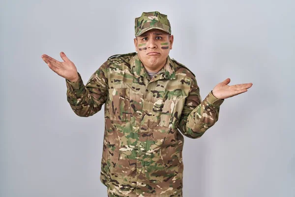 Hispanic Young Man Wearing Camouflage Army Uniform Clueless Confused Expression — Stock Photo, Image