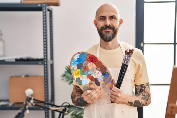 Young Bald Man Artist Smiling Confident Holding Paintbrushes Palette Art — Stock Photo, Image