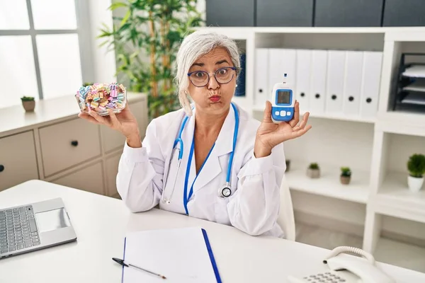 Middle Age Woman Grey Hair Wearing Doctor Uniform Holding Glucose — Stock Photo, Image