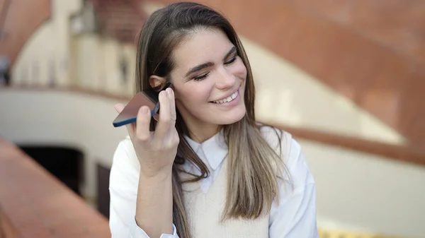 Young Beautiful Hispanic Woman Listening Voice Message Smiling Street — Stock Photo, Image