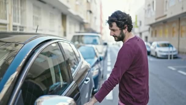 Young Hispanic Man Opening Car Door Sitting Seat Street — Stock Video