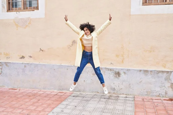 Young Middle East Woman Excutive Smiling Confident Jumping Street — Stockfoto