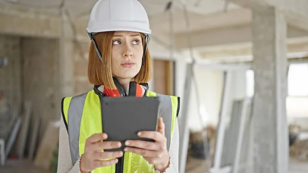Young Blonde Woman Architect Using Touchpad Serious Expression Construction Site — Stock Photo, Image