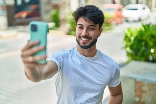 Young Hispanic Man Smiling Confident Making Selfie Smartphone Street —  Fotos de Stock