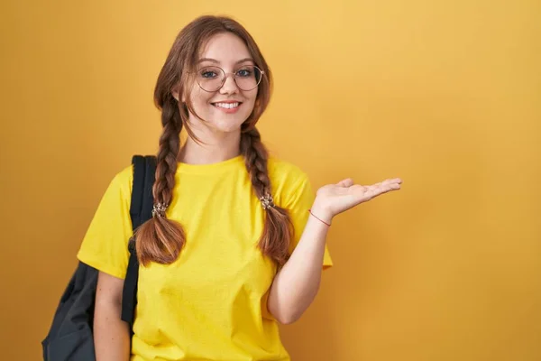 Young Caucasian Woman Wearing Student Backpack Yellow Background Smiling Cheerful — Stock Photo, Image