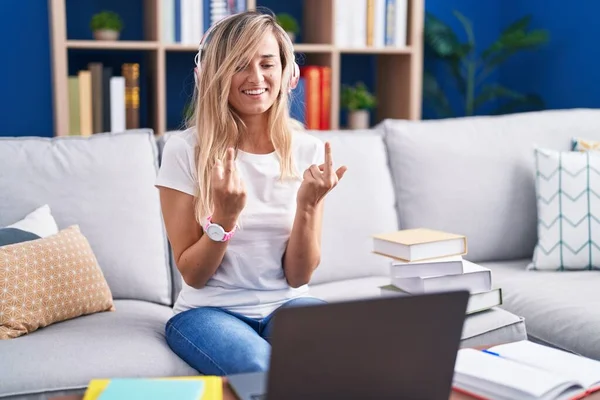 Young Blonde Woman Studying Using Computer Laptop Home Showing Middle — Fotografia de Stock