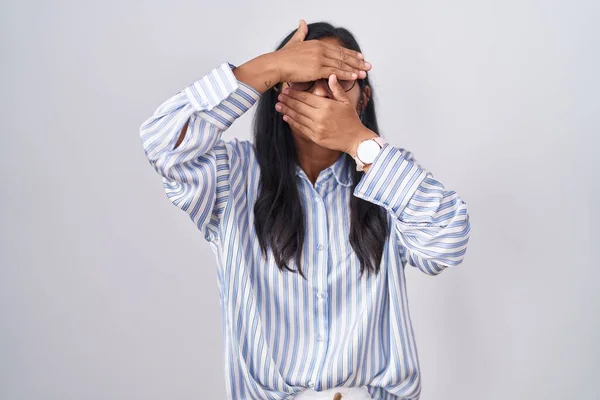 Young Hispanic Woman Wearing Glasses Covering Eyes Mouth Hands Surprised — Stock Photo, Image