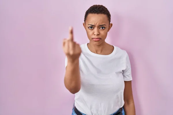 Beautiful African American Woman Standing Pink Background Showing Middle Finger — 스톡 사진