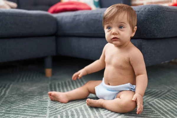 Adorable Caucasian Baby Sitting Floor Relaxed Expression Home — Stock Photo, Image