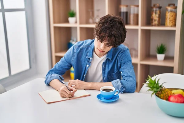 Young Hispanic Man Write Notebook Studying Home — Stock Photo, Image