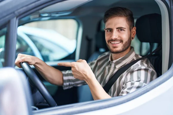 Hispanic Man Beard Driving Car Smiling Happy Pointing Hand Finger — Stock Photo, Image