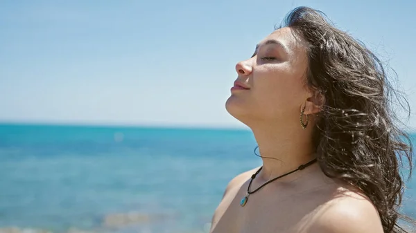 Young Beautiful Hispanic Woman Tourist Wearing Bikini Breathing Beach — Stockfoto