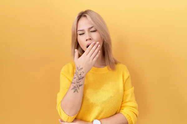 Young Caucasian Woman Wearing Yellow Sweater Bored Yawning Tired Covering — Stock Photo, Image