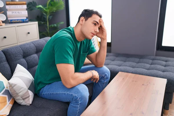 Young Hispanic Man Stressed Sitting Sofa Home — Foto de Stock