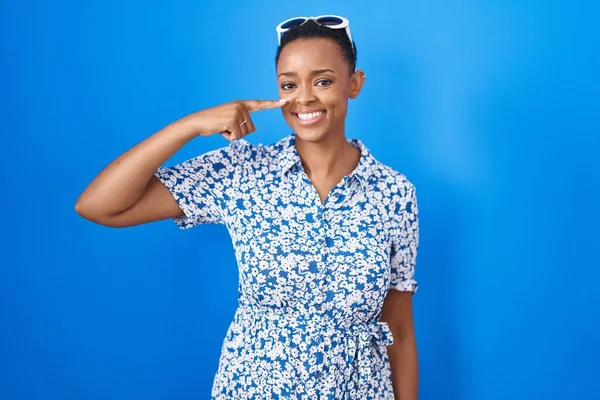 African American Woman Standing Blue Background Pointing Hand Finger Face — Stockfoto