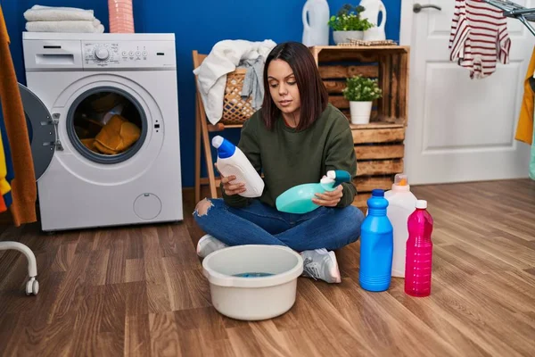 Young Beautiful Hispanic Woman Holding Clean Products Laundry Room — Stok fotoğraf