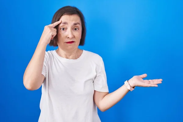 Middle Age Hispanic Woman Standing Blue Background Confused Annoyed Open — 图库照片