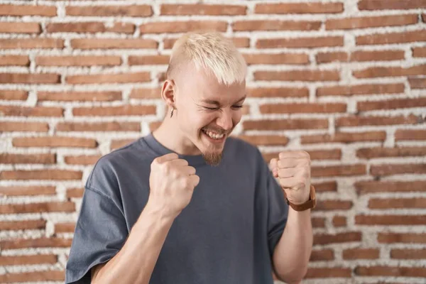 Young Caucasian Man Standing Bricks Wall Very Happy Excited Doing — Stock Photo, Image