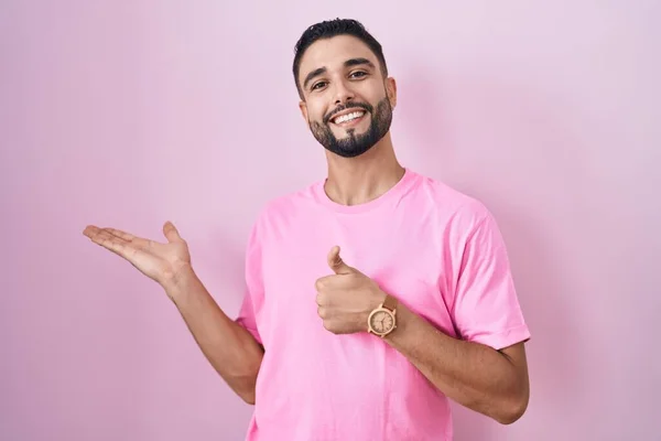 Hispanic Young Man Standing Pink Background Showing Palm Hand Doing — Stock Photo, Image