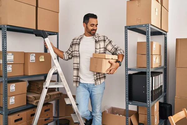 Young Hispanic Man Ecommerce Business Worker Holding Packages Standing Office — Stock Photo, Image