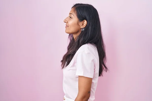 Young Hispanic Woman Standing Pink Background Looking Side Relax Profile — Stock Photo, Image