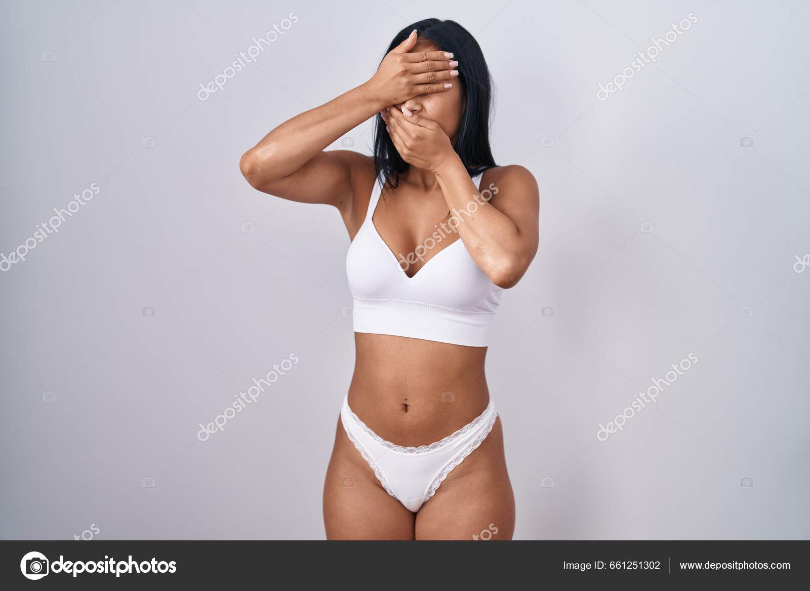 Hispanic Woman Wearing Lingerie Covering Eyes Mouth Hands Surprised Shocked  Stock Photo by ©Krakenimages.com 661251302
