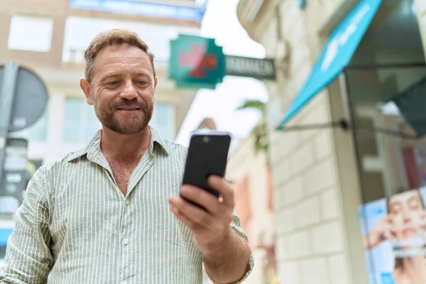 Middle Age Man Smiling Confident Using Smartphone Pharmacy — Fotografia de Stock